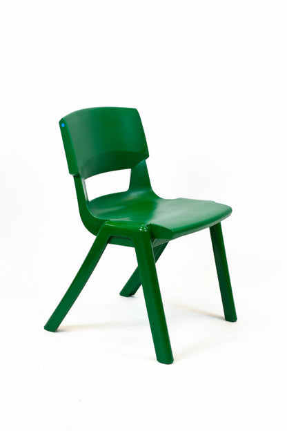 A forest green one-piece postura stacking chair with a smooth, curved backrest.