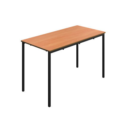 Wooden table with black legs on a white background