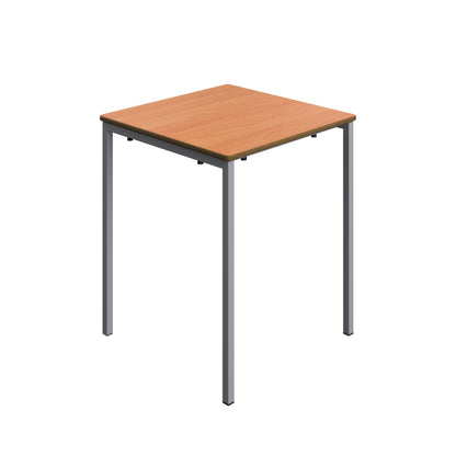 Wooden table with metal legs on a white background
